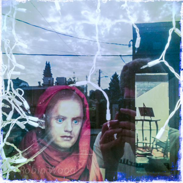 Reflections and multiple rooms with varied lighting create a confusing set of layers. 