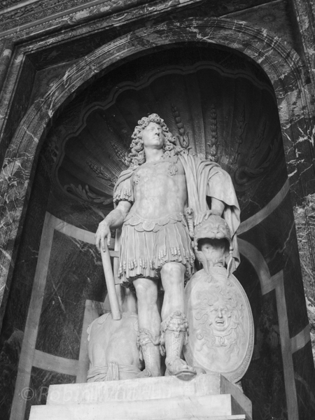 Statues and busts fill any available spot, often portrayed in classical greek style. 