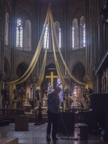 The main altar front, complete with floor cleaning. Notre Dame Cathedral, July 10, 2013.