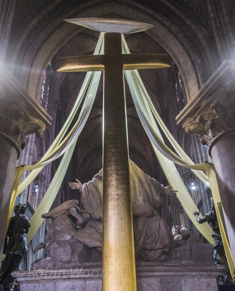 Arches and chandeliers inside Notre Dame Cathedral