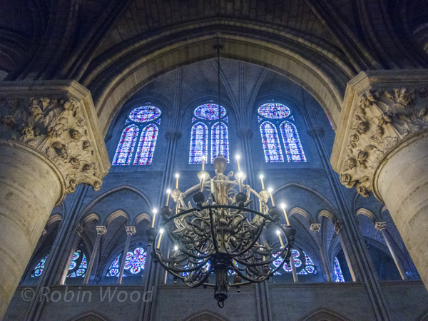 Arches and a chandelier. 