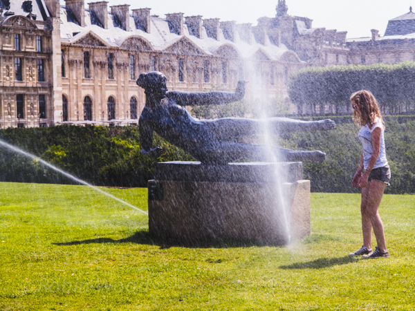 Statues, sprinklers and fun in the sun. 