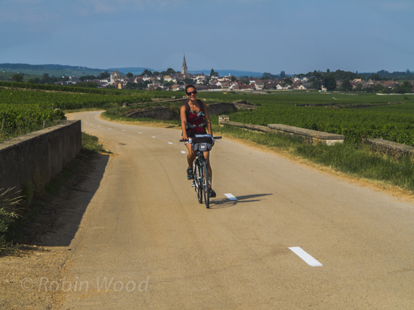 On a very smooth bike path. One of many small towns in the background.