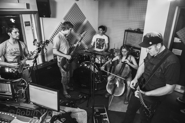 Thought Trade sound check. Nine people and lots of gear in a petite room. 